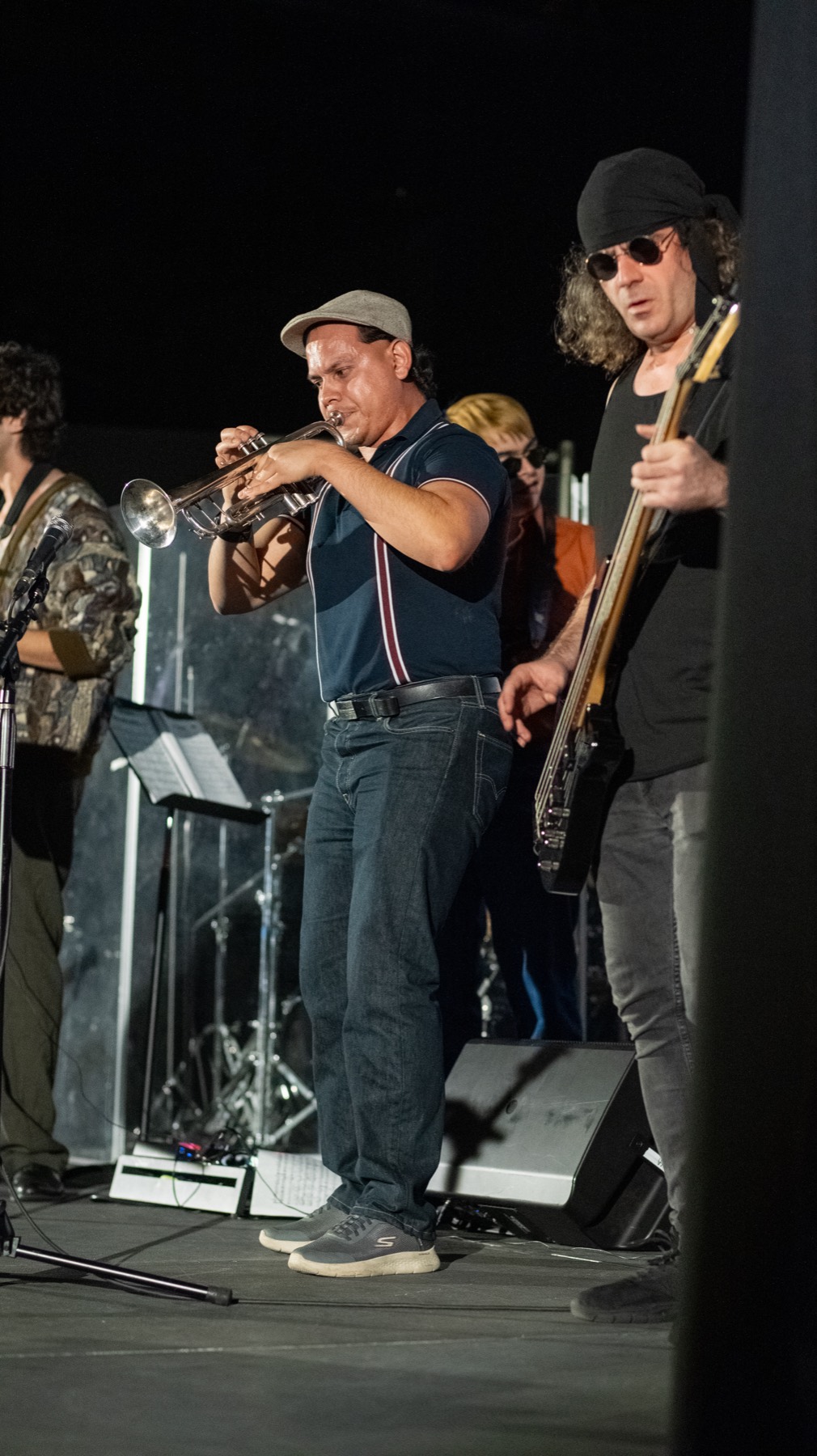 A Jazz Hands musician takes a trumpet solo