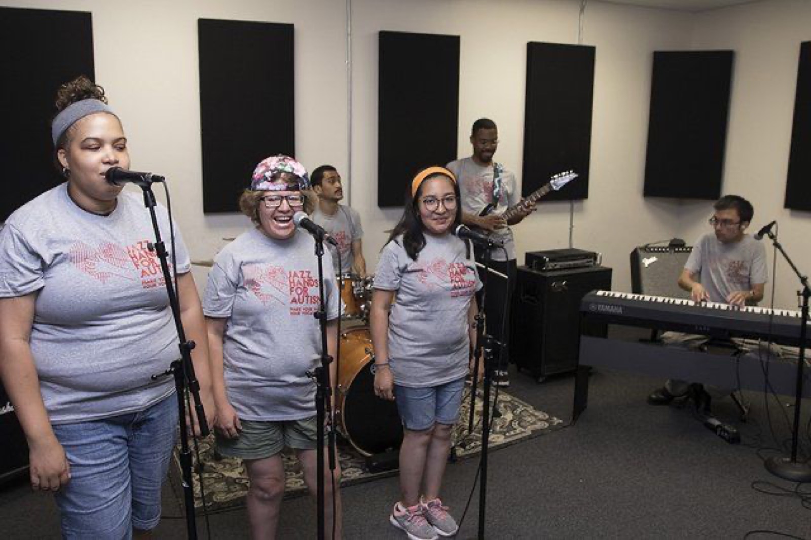 Jazz Hands musicians rehearse together in the studio